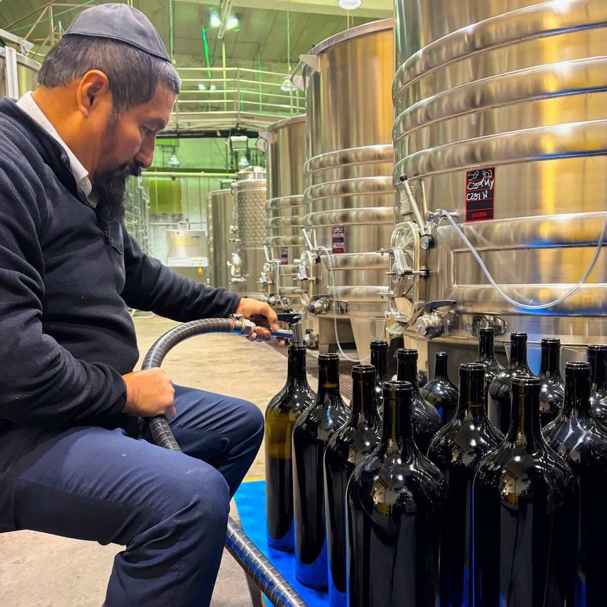 Hevron Heights Manual Bottle Filling